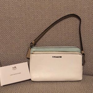 Blue and white coach wristlet